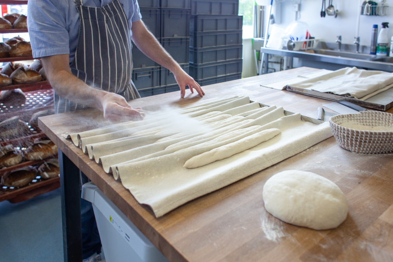 preparing bread dough with flour
